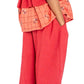 Young girl wearing a red outfit with a white background