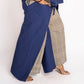 Woman wearing a blue and gray outfit on a white background